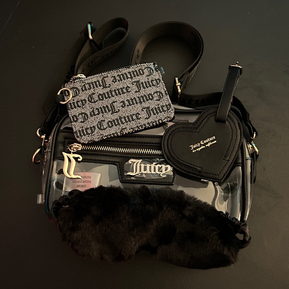 Juicy bag new condition. Never used. 4pc set travel set